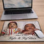 Personalized school-themed mouse pad featuring a colorful mascot design displayed on an office desk
