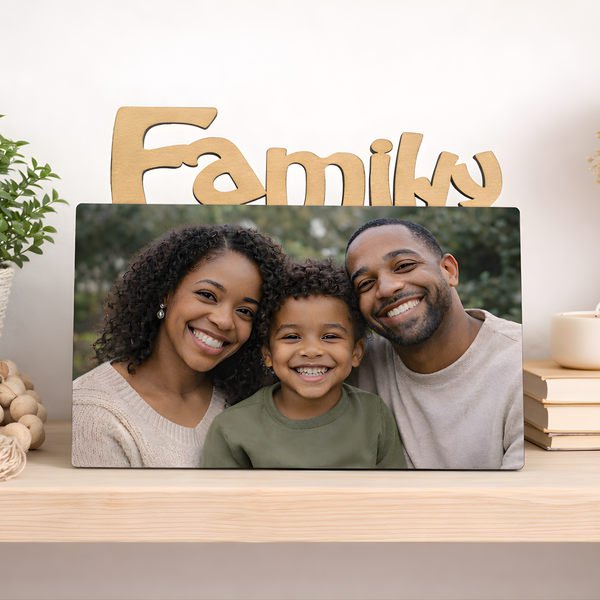Personalized Sisters photo frame featuring a custom photograph displayed on a pink desk
